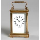 A FRENCH BRASS CARRIAGE CLOCK, RETAILED BY EMANUEL, SOUTHAMPTON