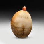 A CHINESE JADE PEBBLE SNUFF BOTTLE, QING DYNASTY, 19TH CENTURY