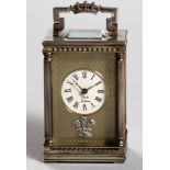 A SILVER MOUNTED MINIATURE CARRIAGE CLOCK COMMEMORATING THE MARRIAGE OF H.R.H. PRINCE CHARLES AND LA