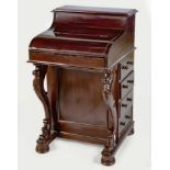 A VICTORIAN MAHOGANY DAVENPORT