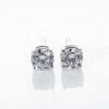 A PAIR OF DIAMOND EAR STUDS