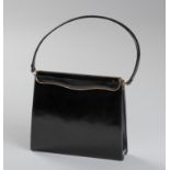 A VINTAGE PATENT LEATHER CLUTCH