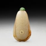 A CHINESE WHITE AND RUSSET JADE "CICADA" SNUFF BOTTLE, QING DYNASTY, 19TH CENTURY