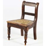 A CAPE STINKWOOD REGENCY CHILD'S CHAIR