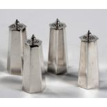 A SET OF FOUR GEORGE V SILVER PEPPERETTES, CHARLES S GREEN & CO LTD, BIRMINGHAM, 1913