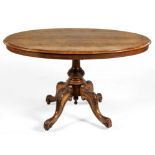 A VICTORIAN WALNUT TABLE