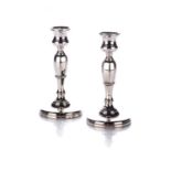 A PAIR OF GEORGE V SILVER CANDLESTICKS, MAKER'S MARK RUBBED, BIRMINGHAM, 1928
