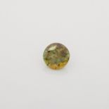 AN UNMOUNTED ROUND MIXED-CUT DEMANTOID GARNET