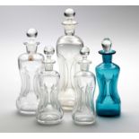 A COLLECTION OF FIVE ASSORTED HOLMEGAARD 'KLUK KLUK' BOTTLES DESIGNED BY JACOB E BANG, 1960s