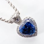 A TANZANITE AND DIAMOND PENDANT