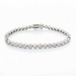 A DIAMOND TENNIS BRACELET