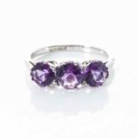 AN AMETHYST TRILOGY RING