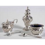 AN EDWARD VII SILVER MUSTARD POT, SALT AND PEPPERETTE, SAMUEL M LEVI, BIRMINGHAM, 1909