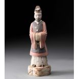 A CHINESE POTTERY FIGURE OF AN OFFICIAL, MING DYNASTY, 1368 - 1644