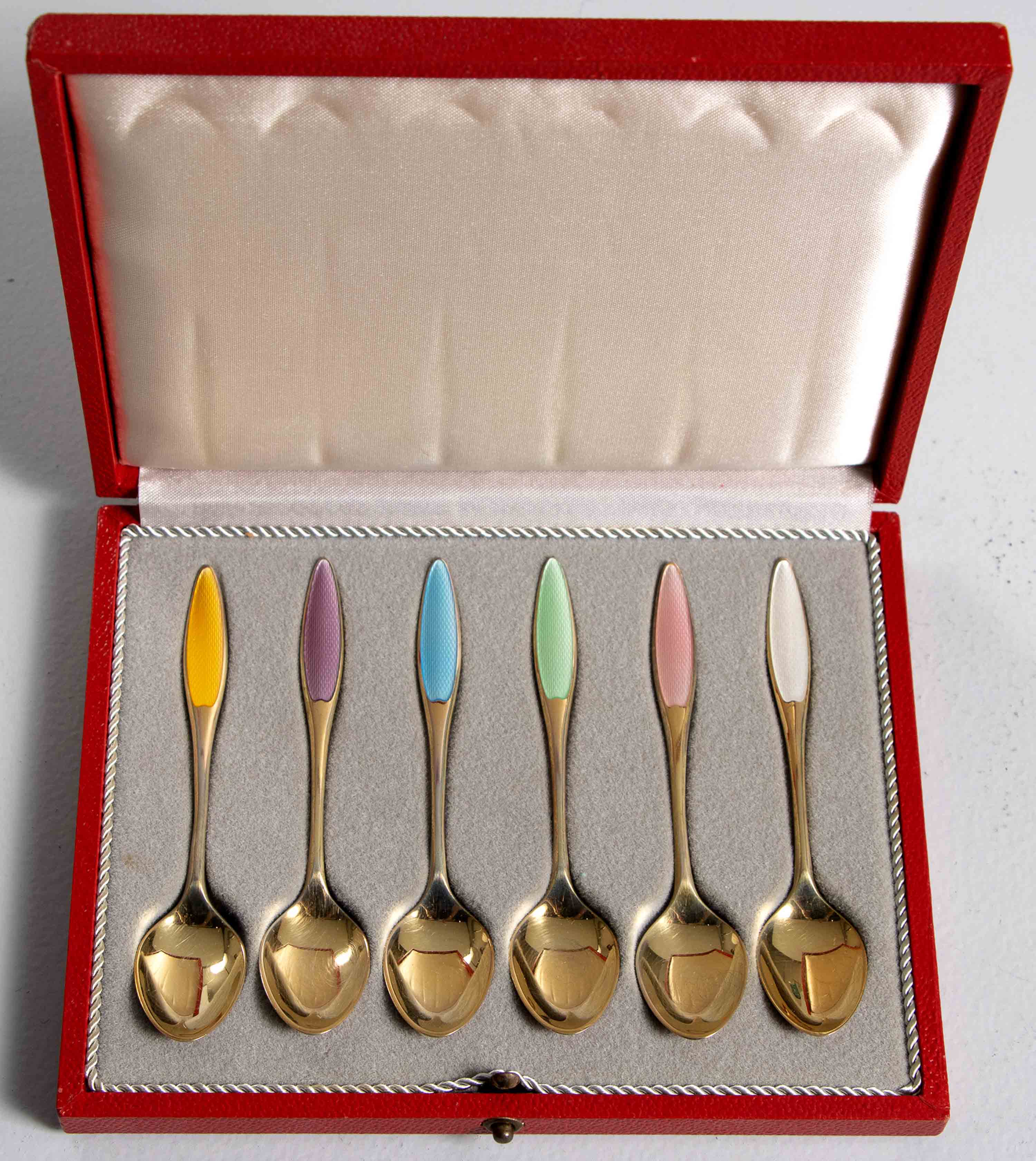 A DANISH CASED SET OF SIX SILVER-GILT AND ENAMEL MOCHA SPOONS, POUL FRIGAST, COPENHAGEN