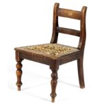 A CAPE STINKWOOD REGENCY CHILD'S CHAIR