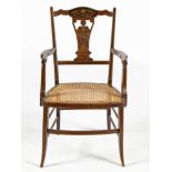 AN EDWARDIAN MAHOGANY AND INLAID ARMCHAIR