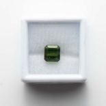 AN UNMOUNTED EMERALD-CUT GREEN TOURMALINE