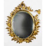 A GILT-METAL MIRROR, 19TH CENTURY