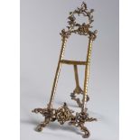 A VICTORIAN BRASS TABLETOP EASEL