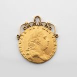 A GOLD COIN PENDANT