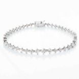 A DIAMOND TENNIS BRACELET