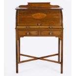 AN EDWARDIAN MAHOGANY CYLINDER BUREAU