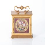 A BRASS MANTLE CLOCK