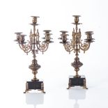 A PAIR OF GILT METAL FIVE-LIGHT CANDELABRA