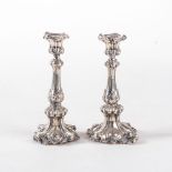 A PAIR OF SHEFFIELD PLATE CANDLESTICKS, EARLY 19TH CENTURY