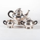 A THREE-PIECE DANISH SILVER BLOSSOM PATTERN TEA SET