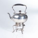 A SILVER TEA KETTLE ON STAND