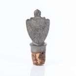 A GERMAN SOUTH WEST AFRICAN PEWTER BOTTLE STOPPER