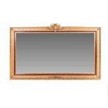 A GILDED OVERMANTEL MIRROR, MODERN