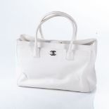 A CHANEL IVORY EXECUTIVE TOTE