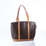 A LOUIS VUITTON BABYLONE BAG