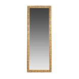 A WALL-MOUNTED MIRROR, MODERN