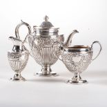 AN ELECTROPLATE THREE-PIECE TEA SET