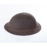 A WWI BRITISH MKI BRODIE 1917 STEEL HELMET