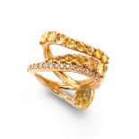 A YELLOW SAPPHIRE AND DIAMOND DRESS RING