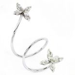 A SWIRL DESIGN MARQUISE CUT DIAMOND DRESS RING