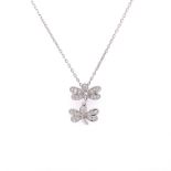 A DOUBLE DRAGONFLY DIAMOND PENDANT