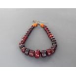 RED AMBER NECK PIECE, ETHIOPI,A, beads date to between 1910 - 1930s
