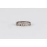 A DIAMOND HALF-ETERNITY RING