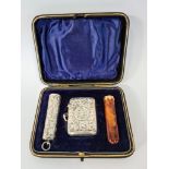 A SILVER VESTA CASE, CIGARETTE HOLDER CASE AND CIGARETTE HOLDER, SHEFFIELD, 1919