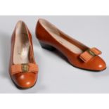 A PAIR OF VINTAGE SALVATORE FERRAGAMO VARA BOW BURNT ORANGEÂ PUMPS