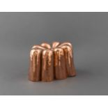A COPPER JELLY MOULD