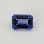 AN UNMOUNTED EMERALD-CUT TANZANITE