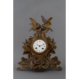 A LOUIS XV STYLE GILT-METAL BRACKET CLOCK