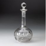 A CUT-GLASS DECANTER